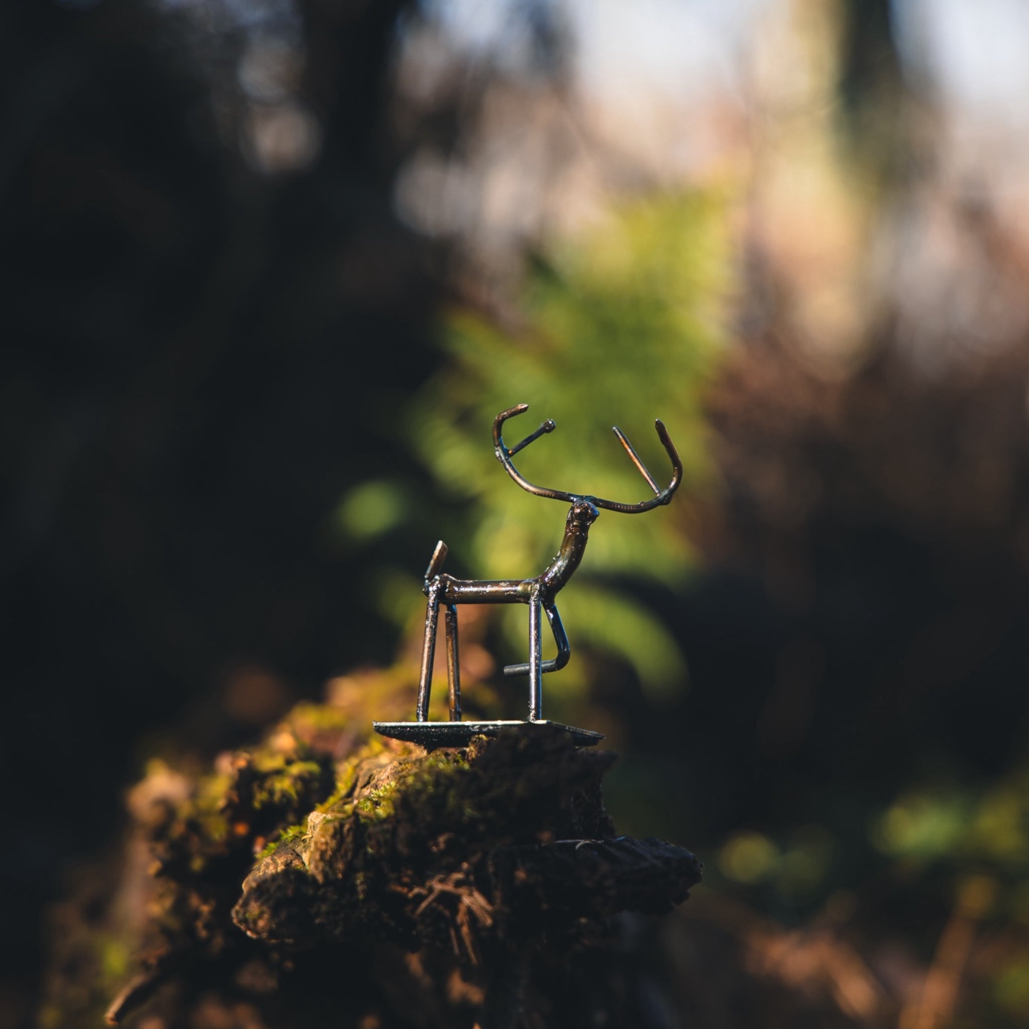 BOW HUNTER AND DEER - WILDERNESS-THEMED RAILROAD SPIKE SCULPTURE